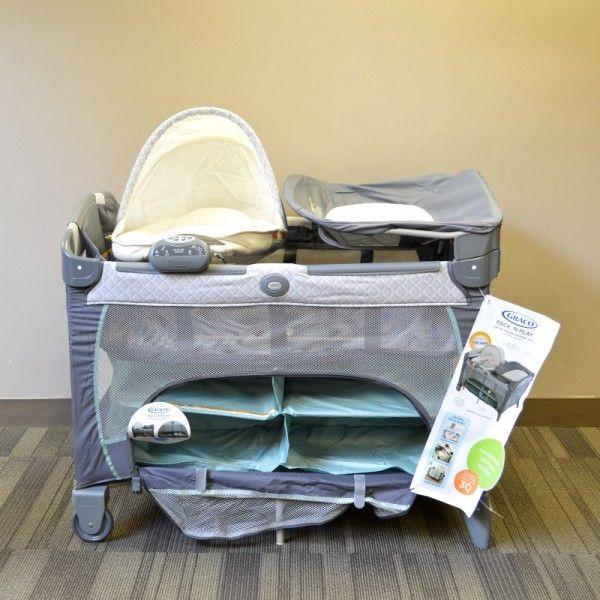 Pack n play newborn best sale napper dlx