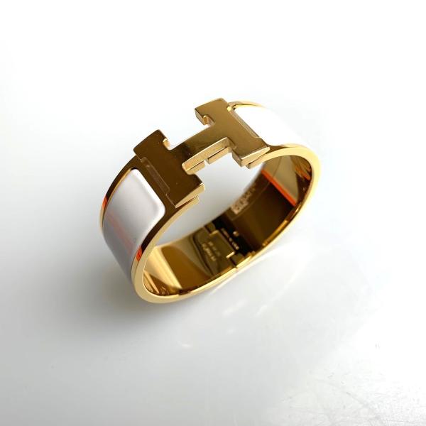 Hermès バングル ホワイト/ゴールド ブレスレット 《ケリー》 PM | Hermès - エルメス-公式サイト