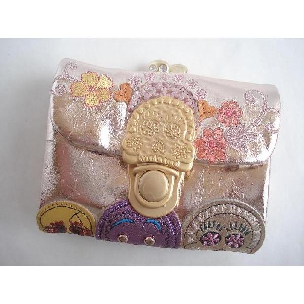 ツモリチサト（tsumori chisato CARRY）折財布 ガマ口 スマイル