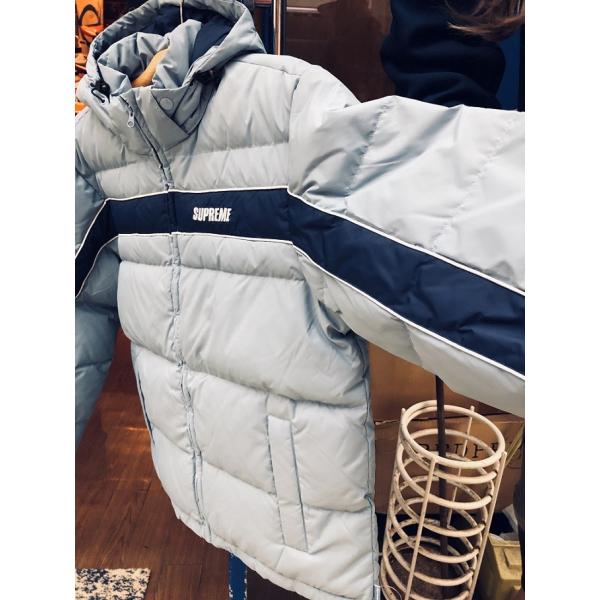 Stripe panel outlet down jacket supreme